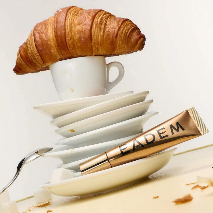 EADEM – Le Chouchou Exfoliating + Softening Peptide Lip Balm - Boba Bounce - Croissant au Beurre - clear with shimmery gold